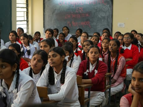 A full classroom of students in a coaching session